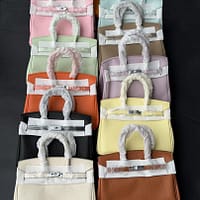 Hermès Luxury Pebble-Grain Textured Satchel – Iconic Top-Handle Handbag with Padlock and Designer Horse Charm